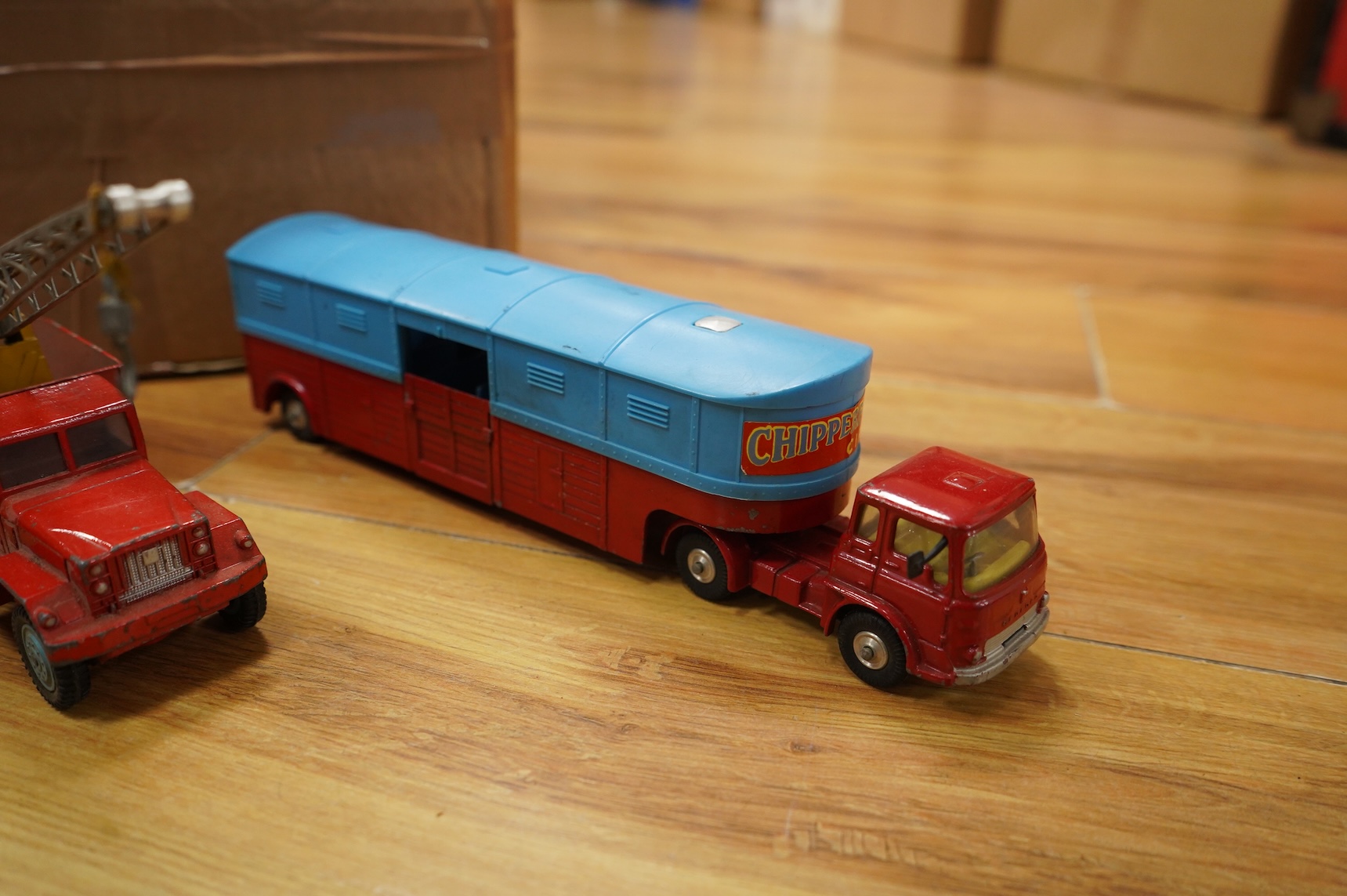 A collection of forty Corgi Toys and fourteen Matchbox Series diecast vehicles, including; The Man From Uncle Oldsmobile, a James Bond Aston Martin DB5 in gold, a Commer 5-ton truck with trailer and a selection of loads,